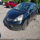 JHMGE8H54AC804931 2010 Honda Fit Lx auction photo thumbnail 2