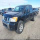 1N6AA07CX9N318688 2009 Nissan Titan Xe/Se/Le/Pro-4X auction photo thumbnail 2