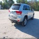 1J4RR4GGXBC697292 2011 Jeep Grand Cherokee Laredo auction photo thumbnail 4