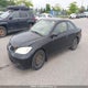 1HGEM21544L810317 2004 Honda Civic Lx auction photo thumbnail 2