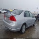 2HHES36613H001233 2003 Acura 1.7El Touring auction photo thumbnail 4
