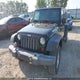 1J4BA3H15AL100416 2010 Jeep Wrangler Unlimited Sport auction photo thumbnail 6