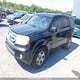 5FNYF4H59AB503716 2010 Honda Pilot Exl auction photo thumbnail 2