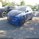 5YJYGDEDXMF121210 2021 Tesla Model Y Standard Range Rear-Wheel Drive auction photo thumbnail 2