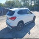 WBXJG9C03M5T46247 2021 BMW X1 xDrive28I/xDrive28I Essential auction photo thumbnail 4
