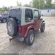 1J4FA59S73P309429 2003 Jeep Tj Sahara auction photo thumbnail 4
