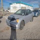 1HGEM22562L812033 2002 Honda Civic Lx auction photo thumbnail 2