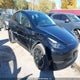 7SAYGDEE1PF774203 2023 Tesla Model Y auction photo thumbnail 6