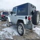 1J8FA54109L790430 2009 Jeep Wrangler Sahara auction photo thumbnail 3