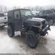 1J4FA59S62P716172 2002 Jeep Tj Sahara auction photo thumbnail 1