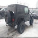 1J4FA59S62P716172 2002 Jeep Tj Sahara auction photo thumbnail 4