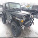 1J4FA59S62P716172 2002 Jeep Tj Sahara auction photo thumbnail 6