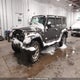 1J4GA59107L185691 2007 Jeep Wrangler Unlimited Sahara auction photo thumbnail 2
