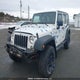 1C4BJWDG1FL513913 2015 Jeep Wrangler Unlimited Sport auction photo thumbnail 6