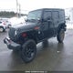 1C4BJWDG2FL590533 2015 Jeep Wrangler Unlimited Sport auction photo thumbnail 2