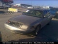 1999 Ford Crown Victoria — photo 2 of 10 | VIN 2FAFP74W5XX166447