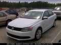 2014 Volkswagen Jetta — photo 2 of 10 | VIN 3VWD17AJ1EM414047