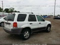 2002 Ford Escape — photo 4 of 10 | VIN 1FMYU03142KB20687