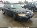 1999 Ford Crown Victoria — photo 1 of 10 | VIN 2FAFP74W7XX179460