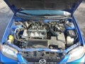 2003 Mazda Protege — photo 10 of 10 | VIN JM1BJ225131139076