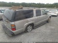 2005 Chevrolet Suburban — photo 4 of 11 | VIN 1GNFK16ZX5J215345