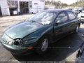 1999 Ford Taurus — photo 2 of 10 | VIN 1FAFP53U1XA212336