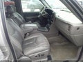2004 GMC Yukon XL — photo 5 of 10 | VIN 1GKFK66UX4J188032