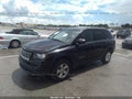 2015 Jeep Compass — photo 2 of 11 | VIN 1C4NJCBA7FD262402