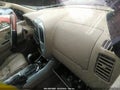 2006 Mercury Mariner — photo 5 of 10 | VIN 4M2CU57156KJ06822