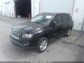 2014 Jeep Compass — photo 2 of 11 | VIN 1C4NJCBA7ED882617