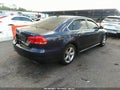 2014 Volkswagen Passat — photo 4 of 10 | VIN 1VWBT7A39EC093850