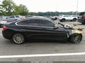 2016 BMW 4 Series — photo 13 of 16 | VIN WBA4A9C53GG505474