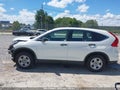 2015 Honda CR-V — photo 15 of 17 | VIN 5J6RM4H38FL010326