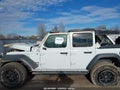 2019 Jeep Wrangler Unlimited — photo 14 of 16 | VIN 1C4HJXDN2KW634568