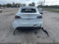 2023 Tesla Model Y — photo 6 of 15 | VIN 7SAYGDEF0PF743789