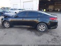 2016 Kia Optima — photo 14 of 15 | VIN 5XXGT4L34GG094184