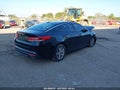2016 Kia Optima — photo 4 of 15 | VIN 5XXGT4L34GG094184