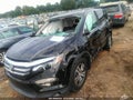 2018 Honda Pilot — photo 6 of 15 | VIN 5FNYF5H59JB011645