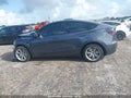 2023 Tesla Model Y — photo 14 of 16 | VIN 7SAYGAEE1PF968969