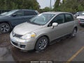 2009 Nissan Versa — photo 2 of 11 | VIN 3N1BC11E19L434205