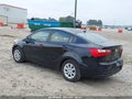 2014 Kia Rio — photo 3 of 16 | VIN KNADN4A39E6397454