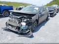 2020 Chevrolet Malibu — photo 2 of 16 | VIN 1G1ZD5ST0LF106135