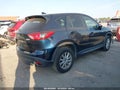 2016 Mazda CX-5 — photo 4 of 16 | VIN JM3KE4CY3G0804393
