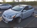 2014 Hyundai Accent — photo 2 of 15 | VIN KMHCU4AE3EU591701
