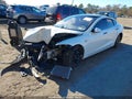 2016 Tesla Model S — photo 2 of 15 | VIN 5YJSA1E23GF144112