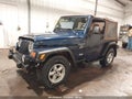 2001 Jeep Wrangler — photo 2 of 17 | VIN 1J4FA49SX1P318682