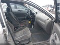 2004 Kia Spectra — photo 5 of 17 | VIN KNAFB161545140139