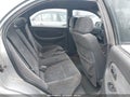 2004 Kia Spectra — photo 8 of 17 | VIN KNAFB161545140139