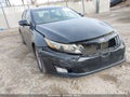 2014 Kia Optima — photo 12 of 15 | VIN 5XXGM4A74EG344040