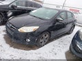 2014 Ford Focus — photo 2 of 11 | VIN 1FADP3F21EL368853
